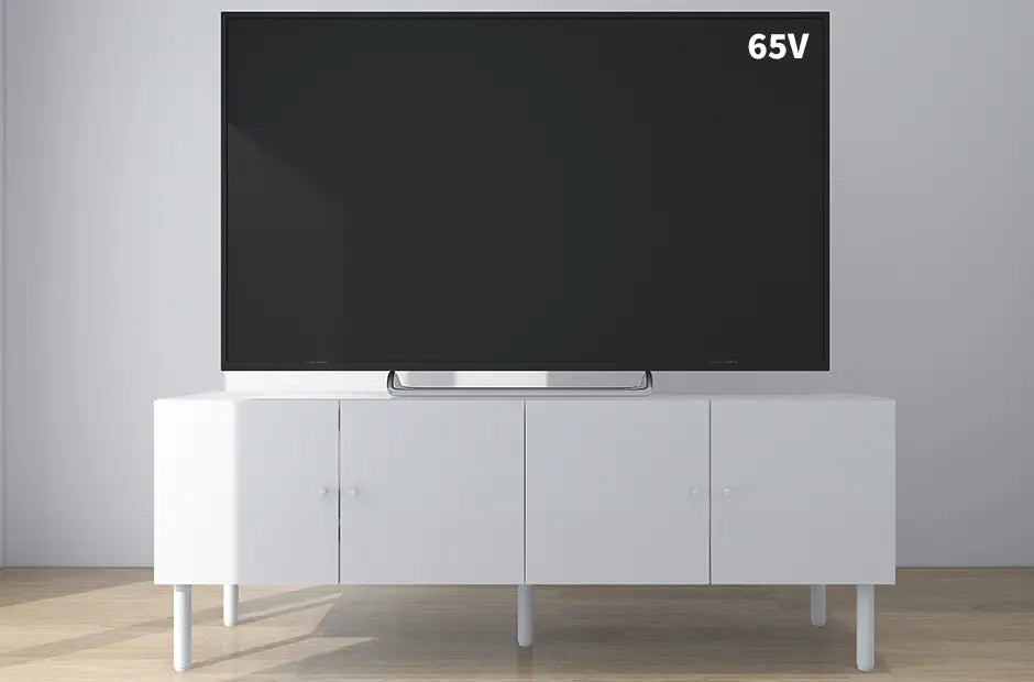 幅160cmのテレビボードと65インチテレビ