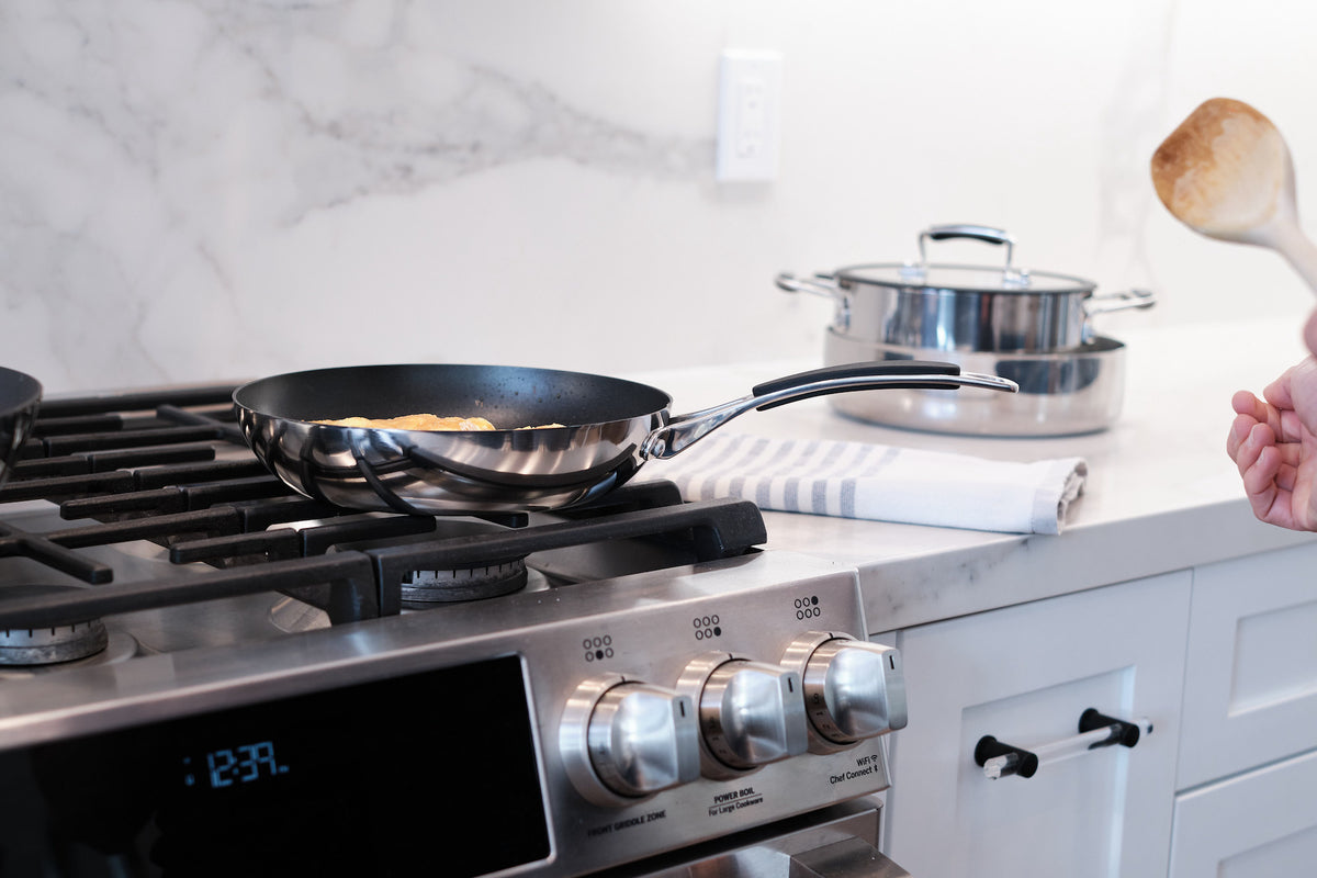 Image of Lacor Home pan in a kitchen with a marble backsplash