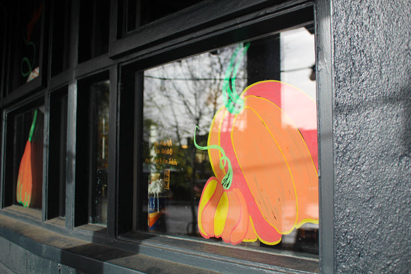 Summer Westbury Park Pub 2021 Bristol, UK  Window glass, chalk paint