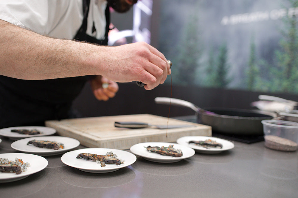 chef preparing sauce for the dishes