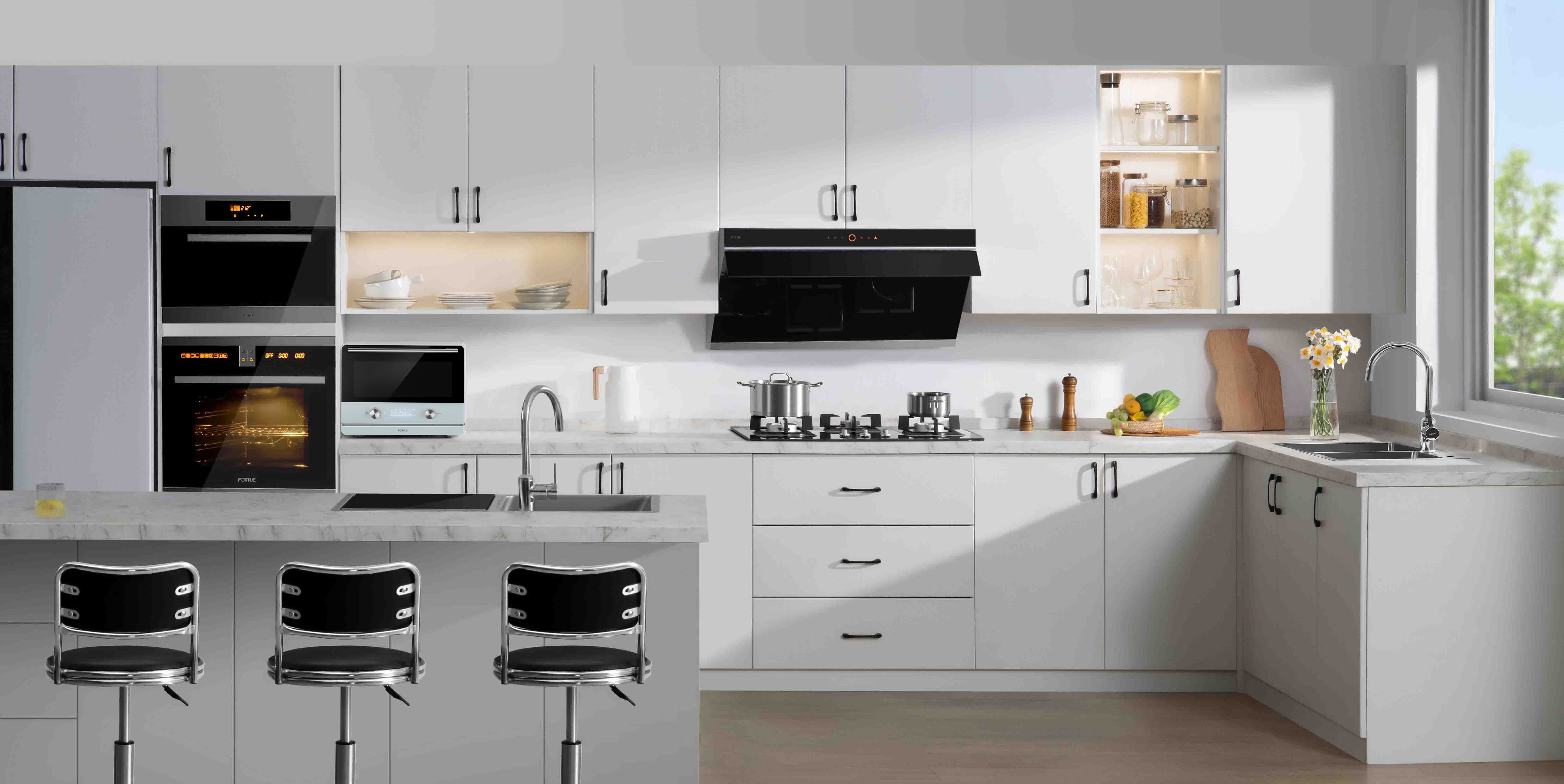 Black under-cabinet range hood in a white kitchen