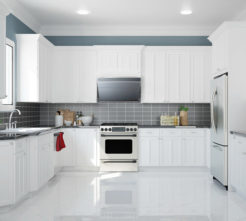 FOTILE JQG01 range hood above a stove in a modern white kitchen.