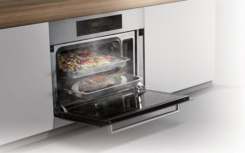 SCD42-F1 24’’ Built-In Steam Oven with fish and vegetables inside.