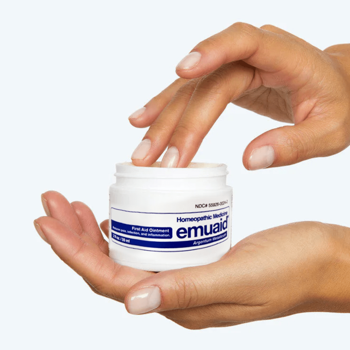 hand with emuaid cream