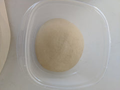 Pizza dough in container