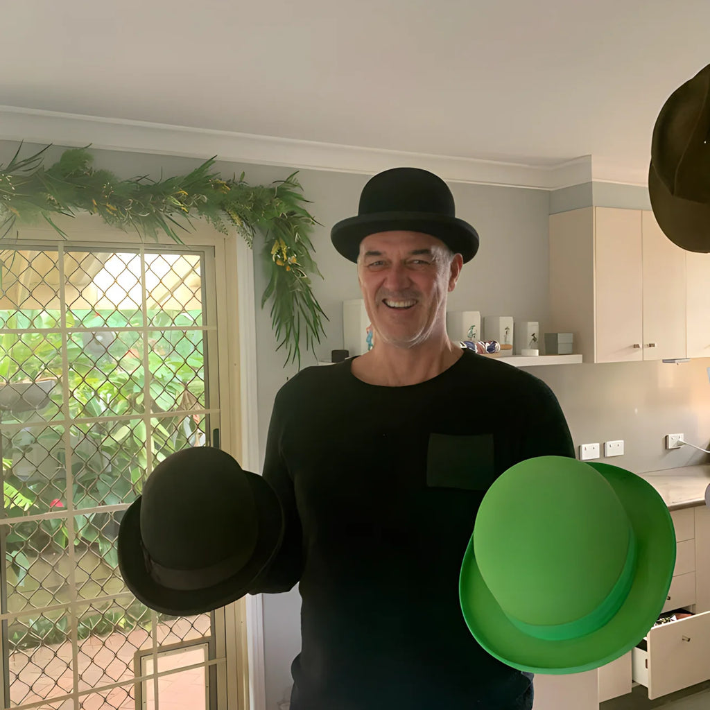 Man stands in front of a camera with Agnoulita hats in hand, featuring a whimsical and lighthearted atmosphere with a combination of dark emerald and light black tones. The scene captures the festive atmosphere reminiscent of the work of photographers Victoria Poyser and Clint Langley, utilizing forced perspective to capture suburban ennui in a unique and captivating way