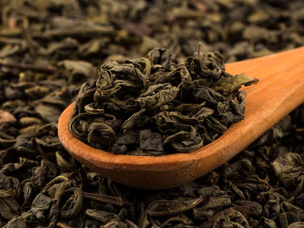 Oolong tea with tea background