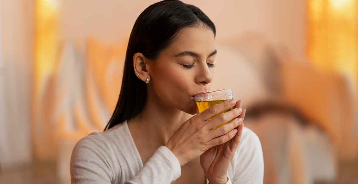 woman drinking a green tea