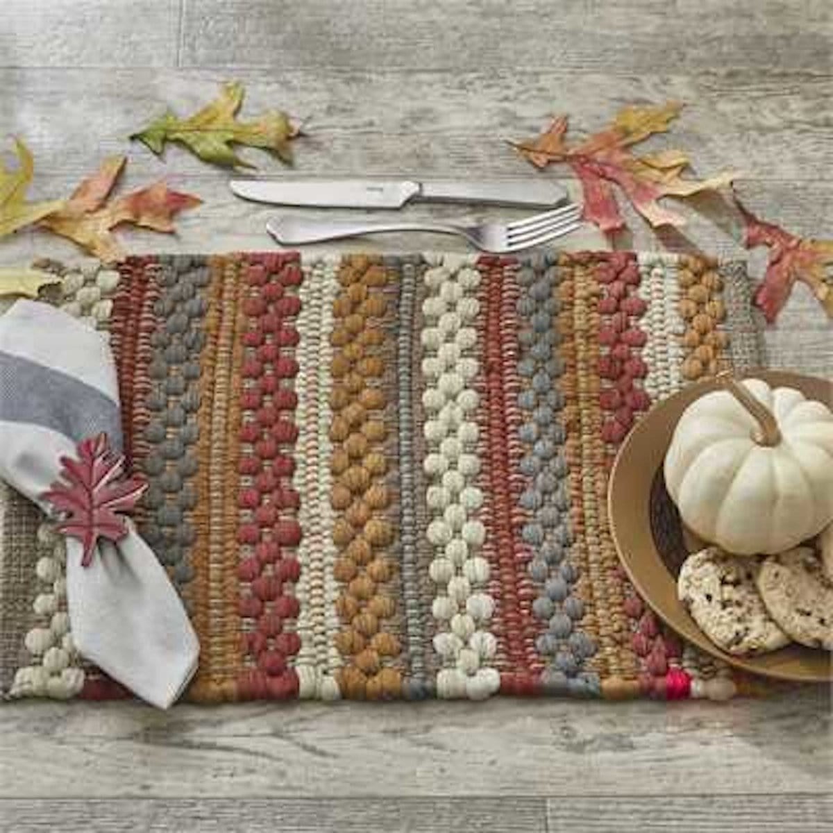 https://cdn.shopify.com/s/files/1/0549/3964/8048/files/gathered-pumpkin-chindi-placemat-43385151422760_1600x.jpg?v=1700282644