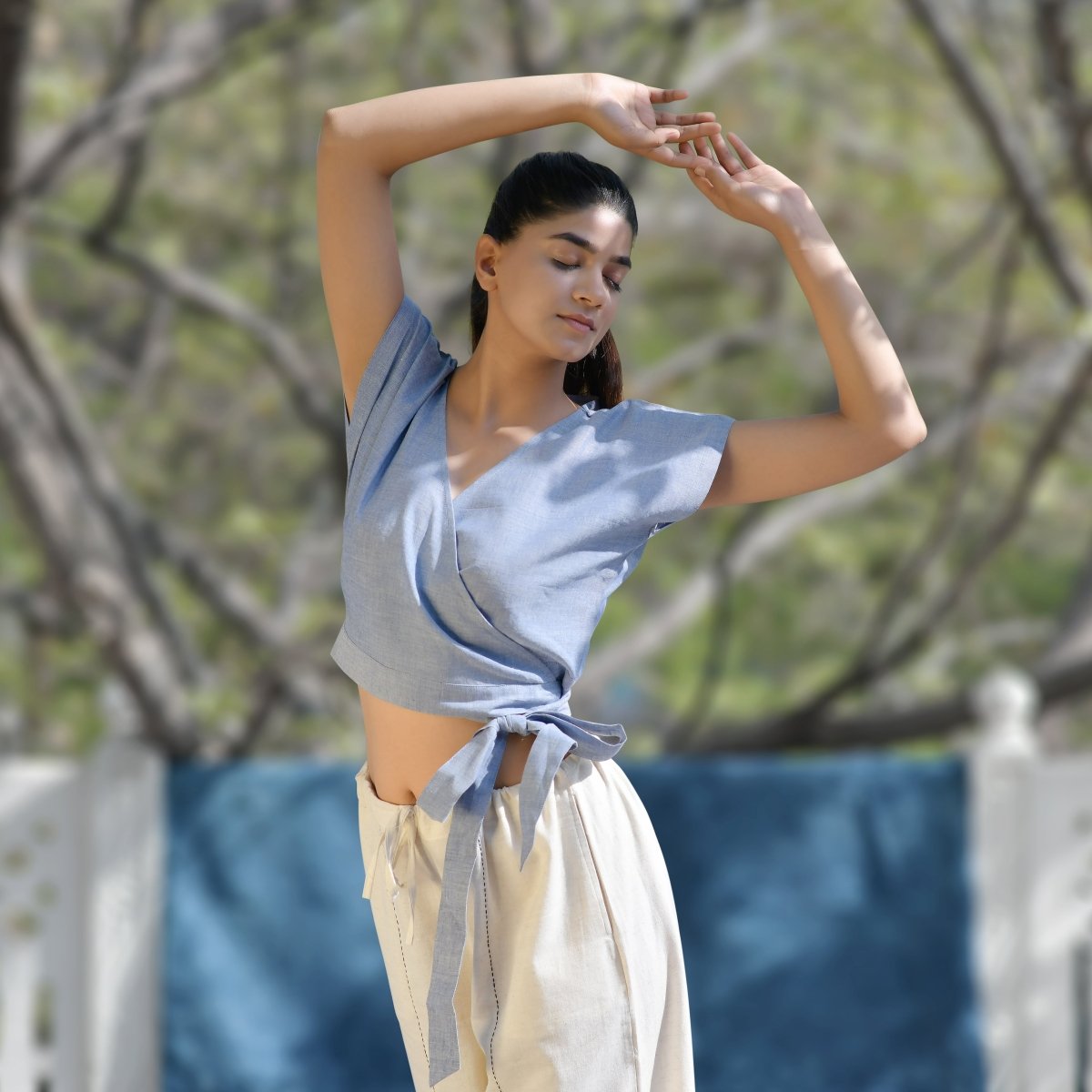https://cdn.shopify.com/s/files/1/0549/4092/6195/products/azure-blue-cotton-crop-top-with-beige-yoga-harem-pant-combo-athleisure-wear-combo-for-womenwomens-wearpt-bl-2047-hs-925215.jpg?v=1696433104