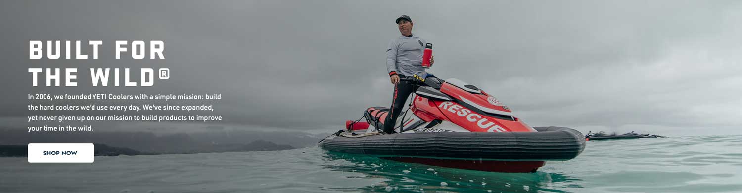 picture of man on a rescue jet ski holding a YETI tumbler - YETI is built for the wild!