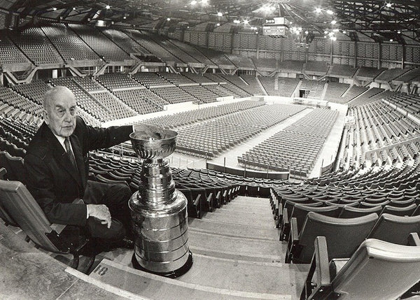 Fred "Cyclone" Taylor inside Vancouver's Pacific Coliseum, pictured with the Stanley Cup