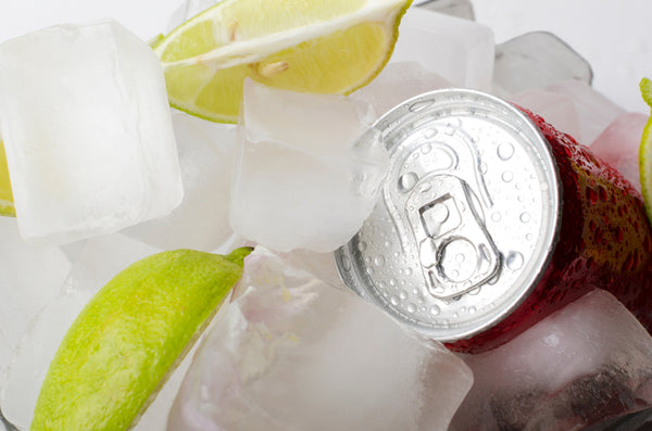 cocktail can with ice and lime slices