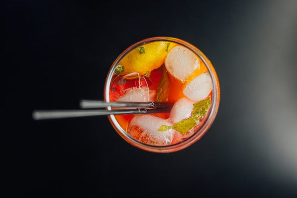 micheland shot from above with straw on black table