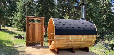 wood fired sauna and shower setup outside