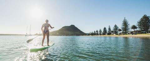 stand up paddle boarding is a healthy way to disconnect from your cell phone