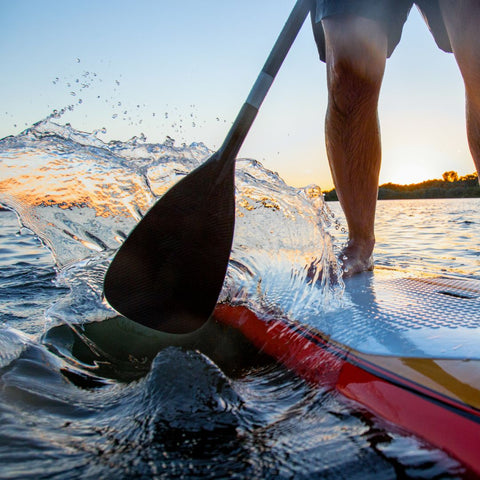 paddleboarder close up on the water