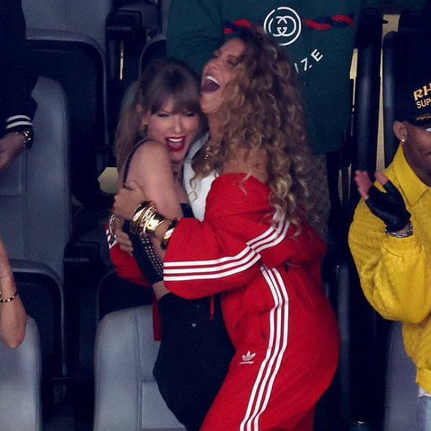 Blake Lively and Taylor Swift cheering at Super Bowl