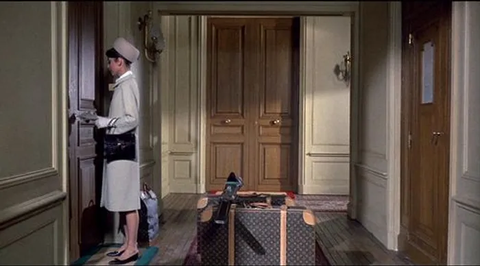 Audrey Hepburn (Regina Lampert) in Charade with Stratos Valises and Monogram Vintage Steamer Bag