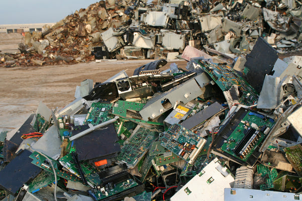 e-waste rubbish dump - a pile of electronic, tech and metal rubbish