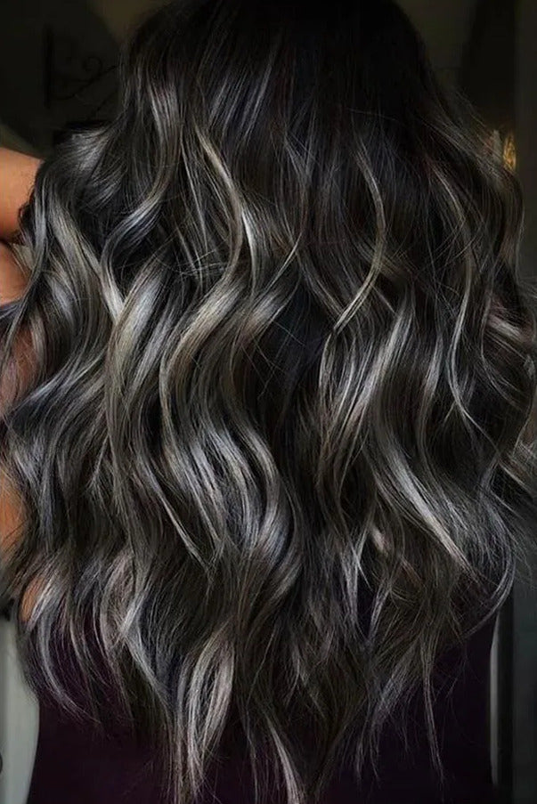 Bold and Edgy Ashy Brown Wavy Curls