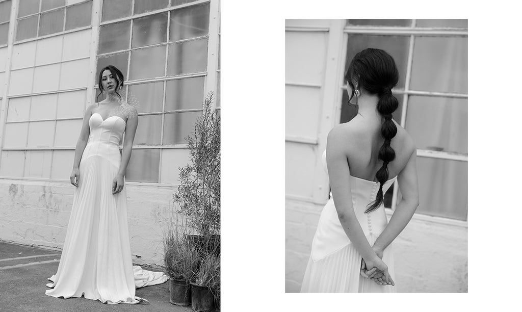 Black and White image of model wearing strapless corset bodice with back details