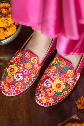 This is an image of Bageecha Pink Espadrilles with a few flowers in background featuring ladies shoes
