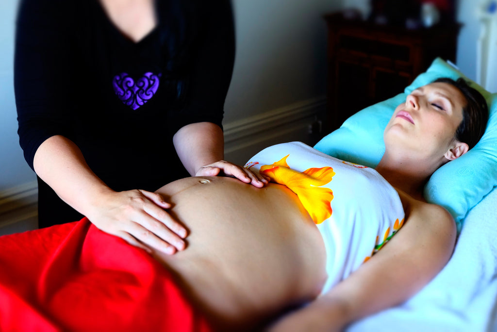 https://cdn.shopify.com/s/files/1/0549/6541/files/aroha-pregnancy-massage_1024x1024.jpg?v=1489372092