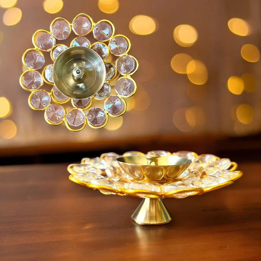 Crafted by skilled artisans using traditional techniques, these diyas create a golden glow imbued with spiritual meaning.