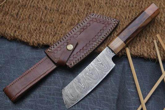 https://cdn.shopify.com/s/files/1/0549/7366/1432/files/11-handmade-santoku-damascus-chef-knife-olive-wood-dark-handle-with-leather-sheath-943_533x.webp?v=1686251517