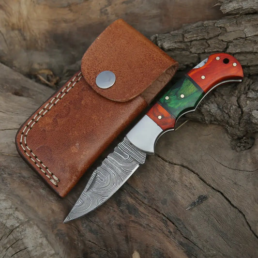 https://cdn.shopify.com/s/files/1/0549/7366/1432/files/6-5-handmade-damascus-pocket-knife-folding-color-wood-handle-wh-5032-179_533x.webp?v=1686334605