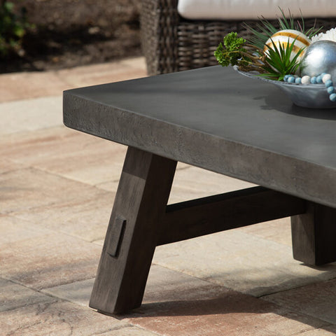 Amherst Coffee Table from Ebel’s Reserve Collection with Concrete-colored top and rustic base