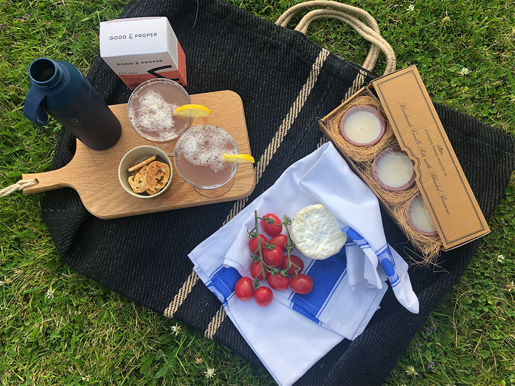 Different Kind of picnic: Maison Bengal bag, Good & Proper Earl Grey tea, Dalit Pavani candles, The Clink Prison catering grade tea towel, Ocean Bottle recycled stainless steel water bottle