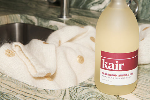Kair Wool, Silk & Delicates Wash by Marble Sink with Cream & Gold Sweater