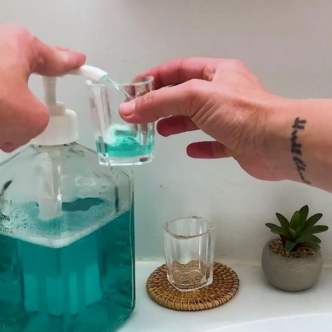 ebun glass mouthwash dispenser with rinse cup