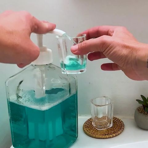 pump mouthwash liquid into a rinse cup