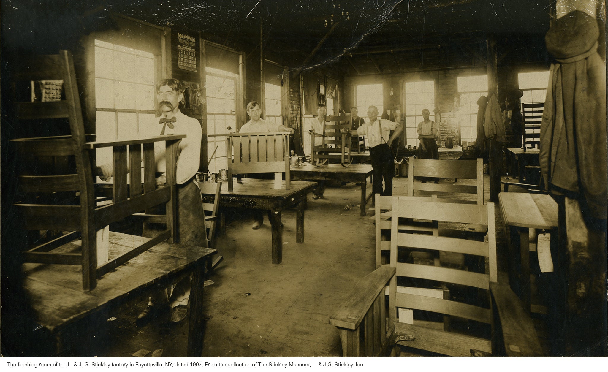 The finishing room of the L. & J. G. Stickley factory in Fayetteville, NY, dated 1907. From the collection of The Stickley Museum, L. & J.G. Stickley, Inc