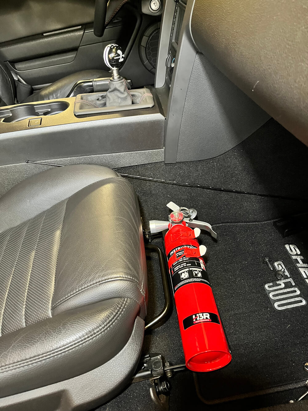 2009 Shelby GT500 Fire extinguisher installation image 1