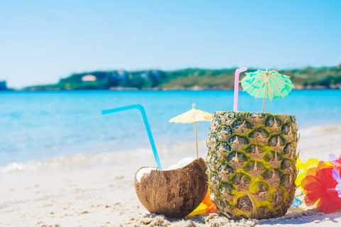 Coconut and Pineapple on a beach