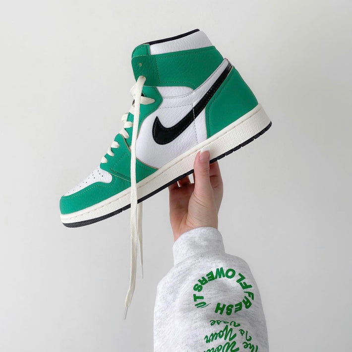 green and white high top jordans