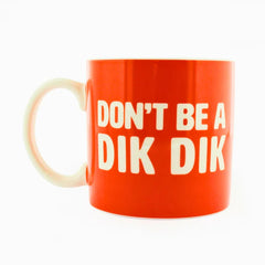 An orange mug with the words: Don't Be A Dik Dik