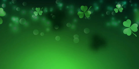 Four Leaf Clovers on a green background