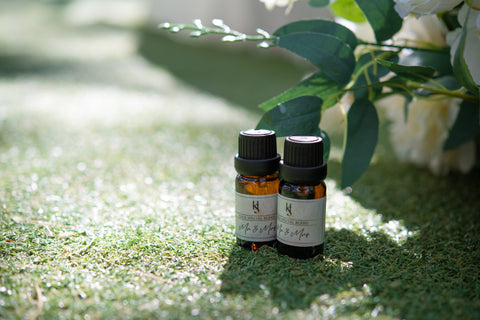 Two of essential oil on the grass