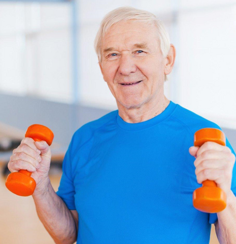 Older man working out with small weights