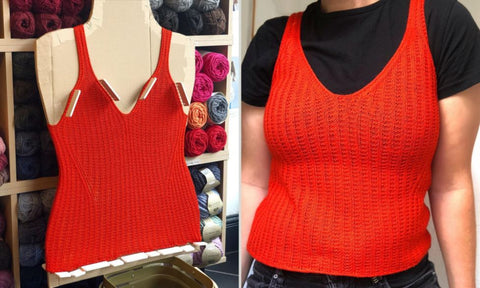 Bright Orange Ellie Summer Top Knit By Meg - Blocked on a cardboard cut out of her body and modelled by her over a black tshirt