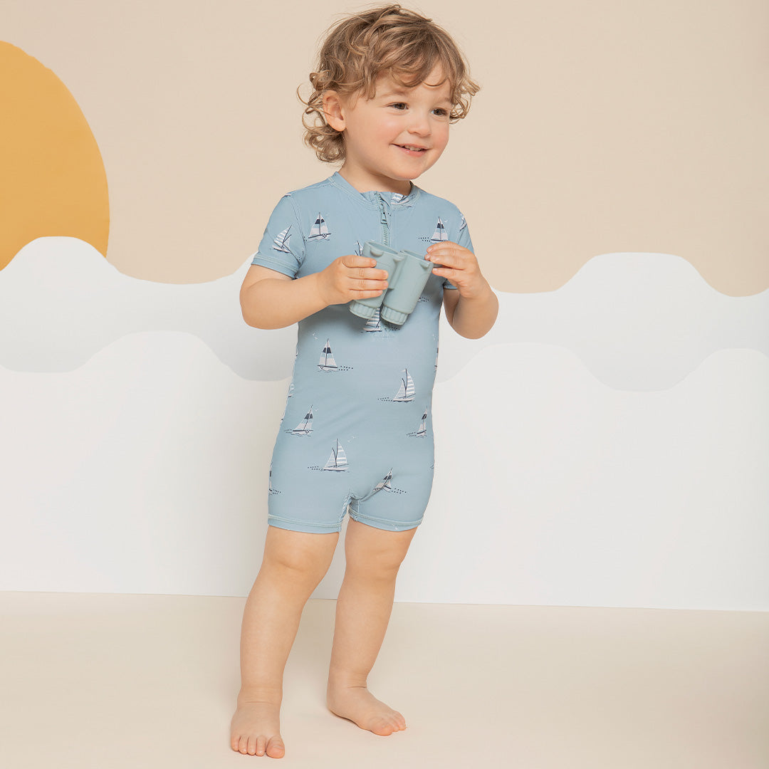 Sailboats on Dusty Blue Short Sleeve Swim Romper | Petit Lem - Jenni Kidz