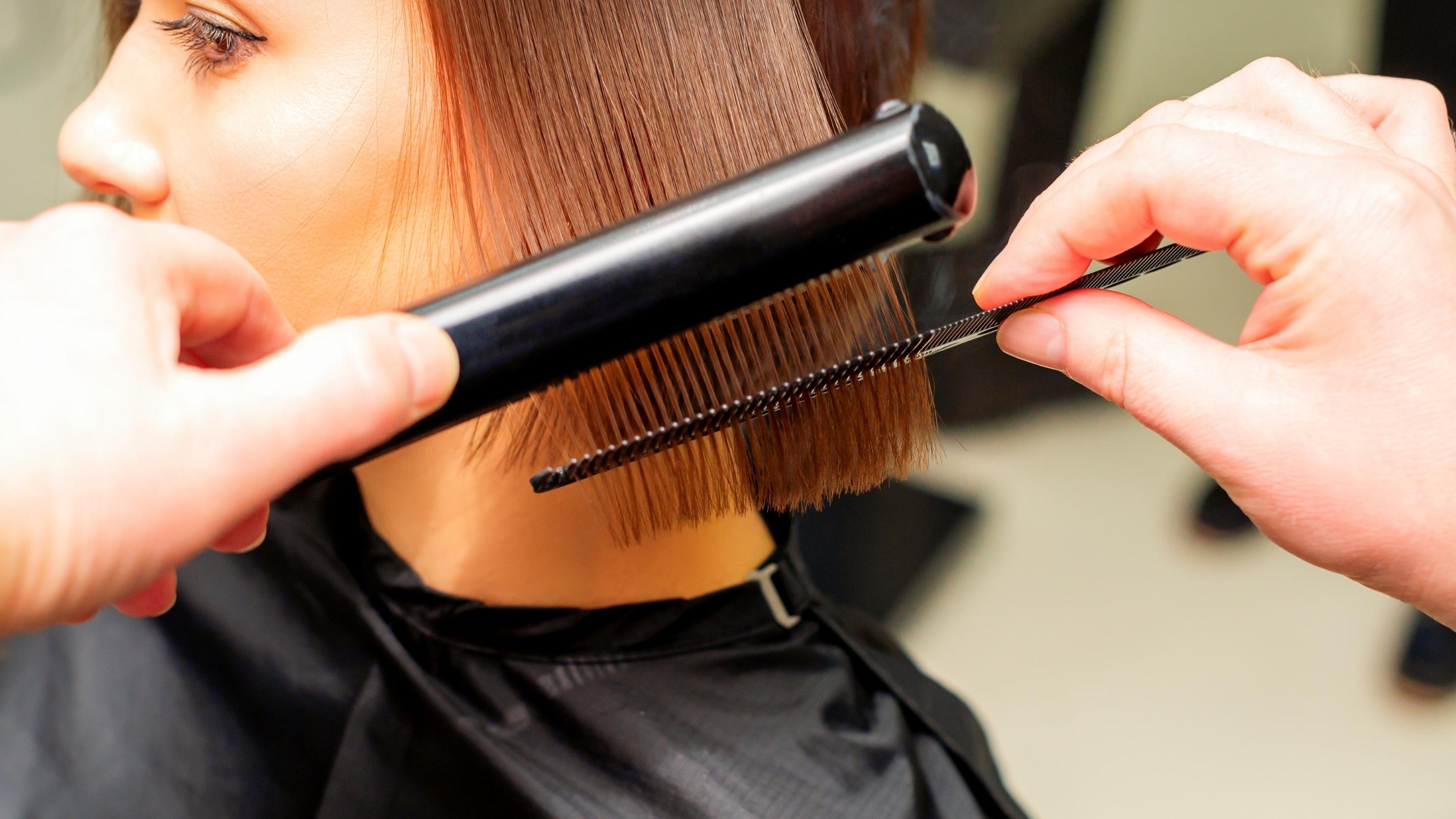 Hair being straightened