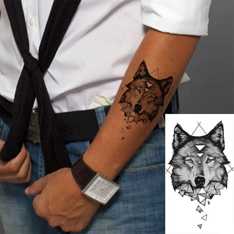 small wolf tattoo wrist