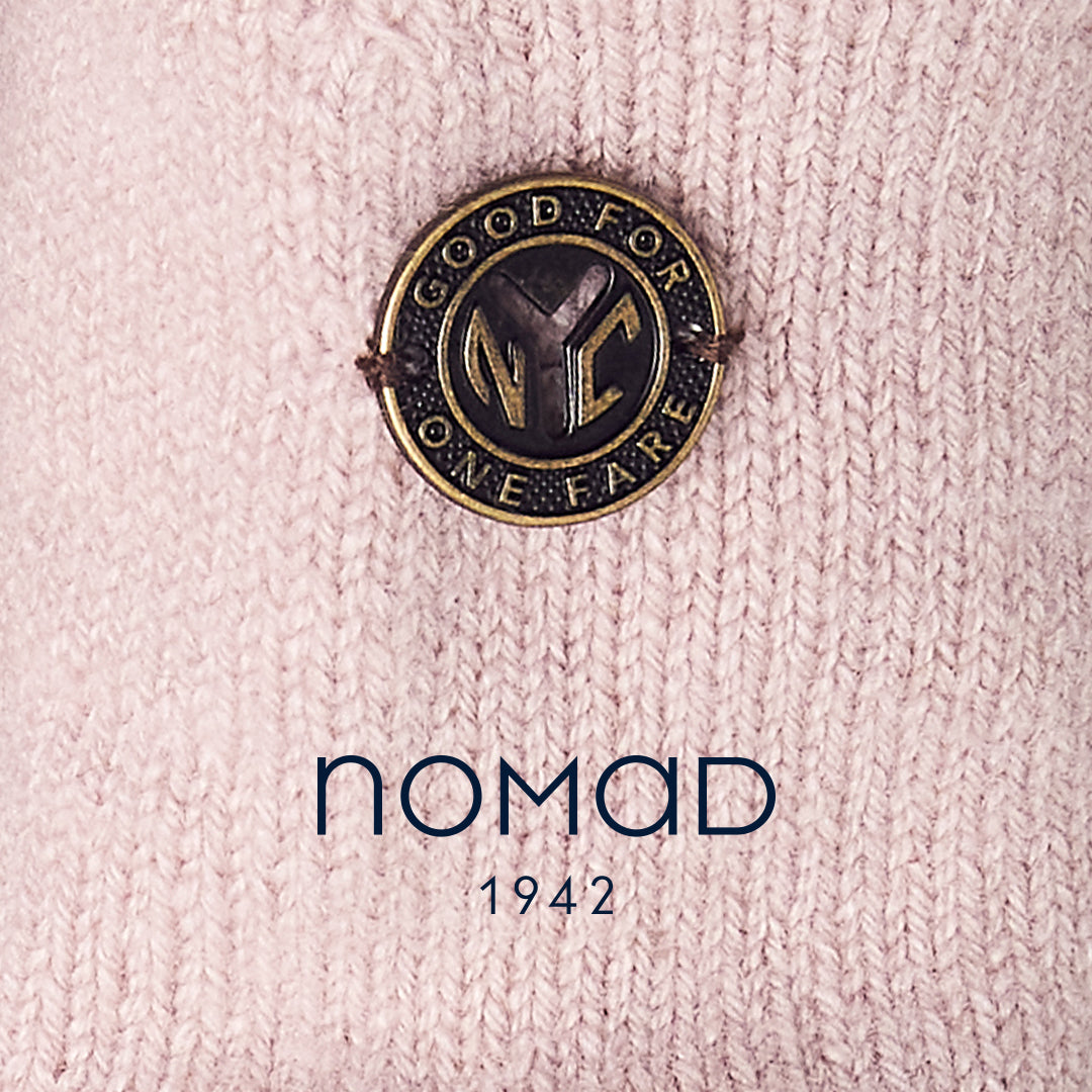 An NYC subway token adorns NOMAD1942 cashmere