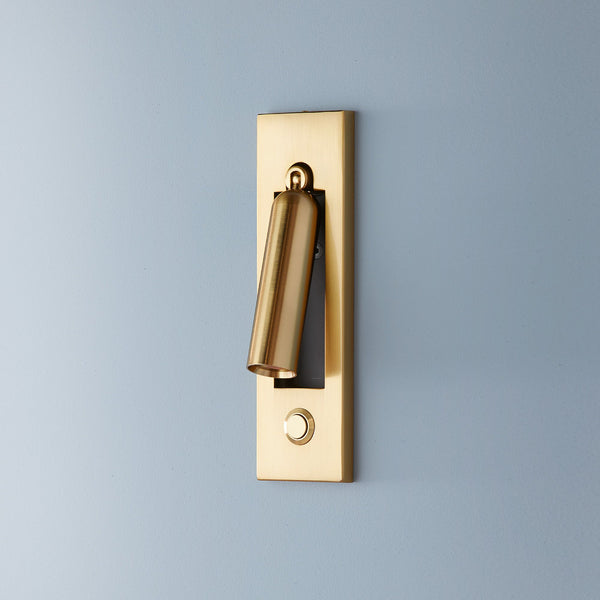 brass reading wall light